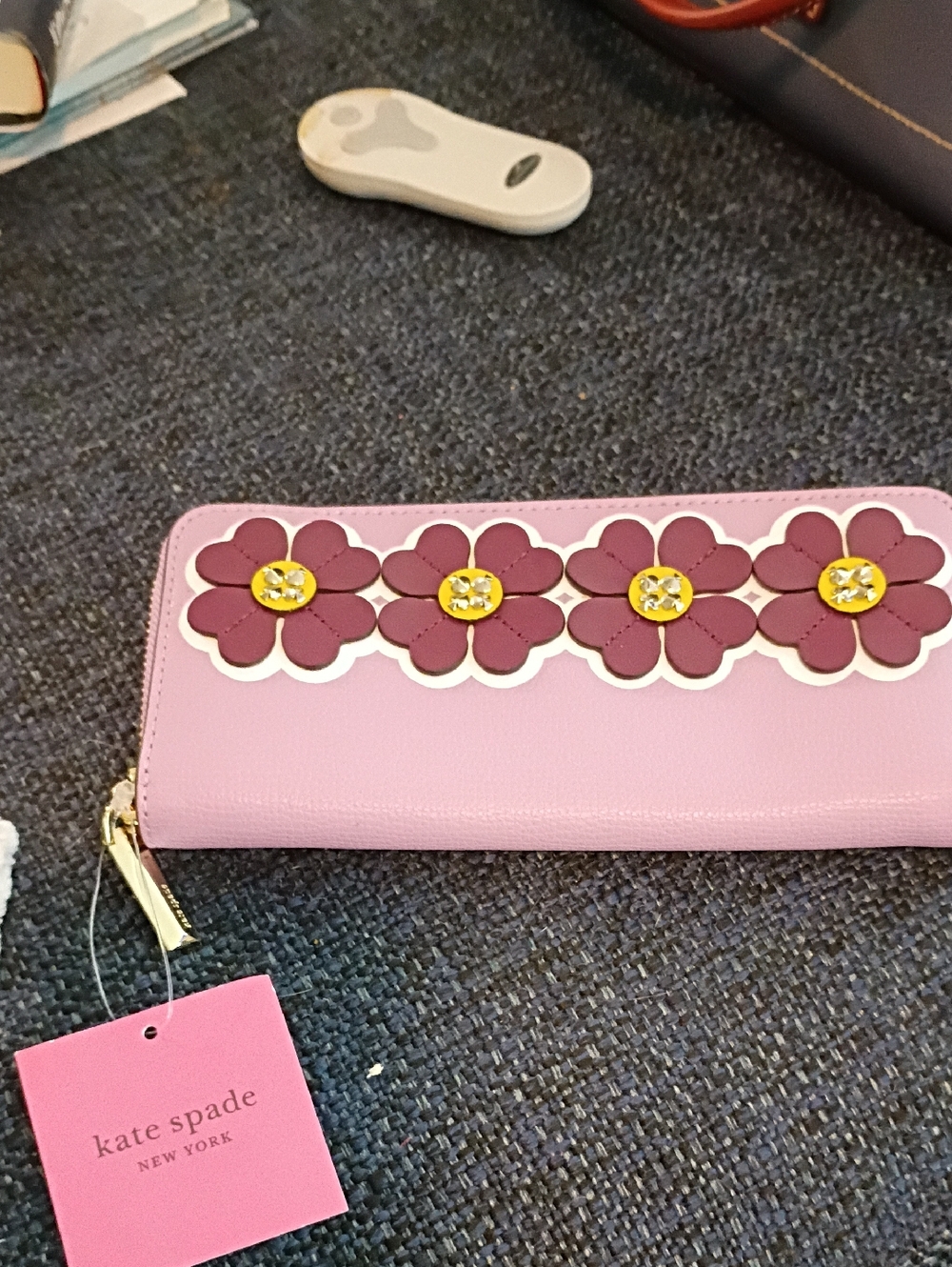 kate spade pink floral zip-around wallet with purple flower appliqués
